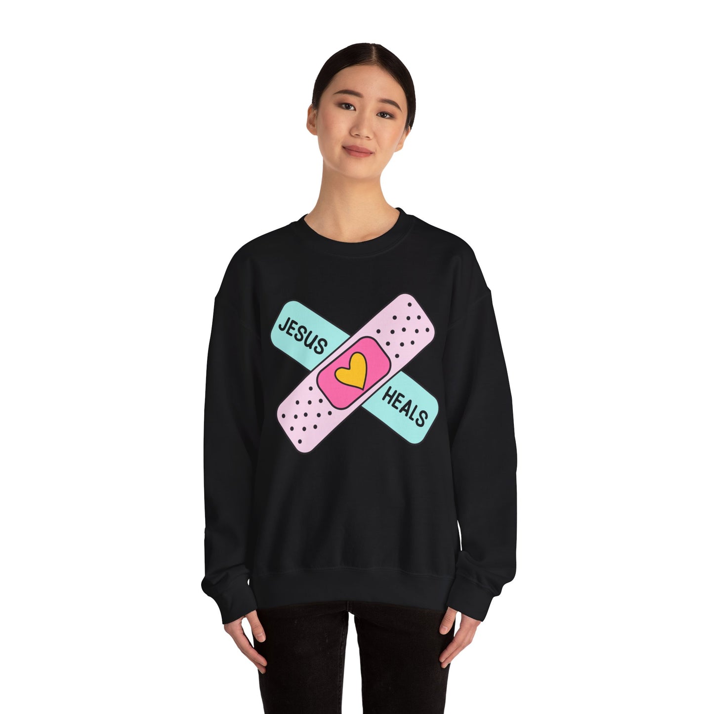 Jesus Heals Unisex Heavy Blend™ Crewneck Sweatshirt